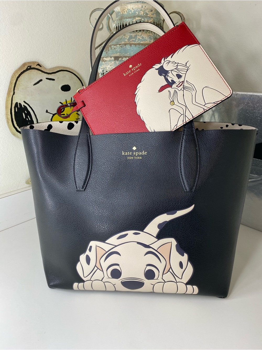 kate spade black Dalmatian tote with red Cruella pouch